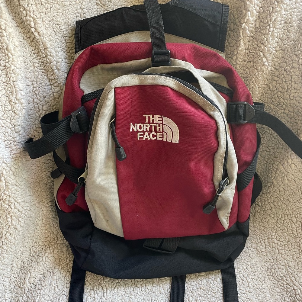 The North Face Burgundy and Black Backpack